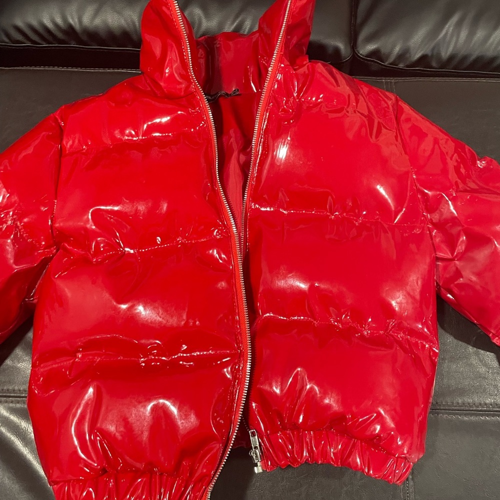 Red puffer jacket.